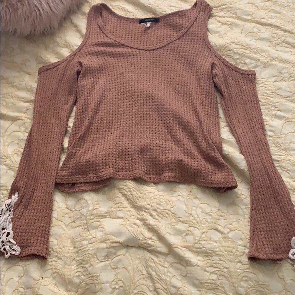 Long sleeve shirt with cut out shoulders